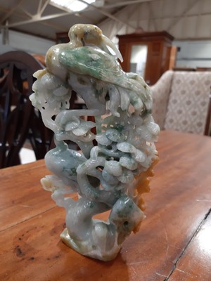 Lot 101 - Nephrite jade carving of two cranes in a pine tree.