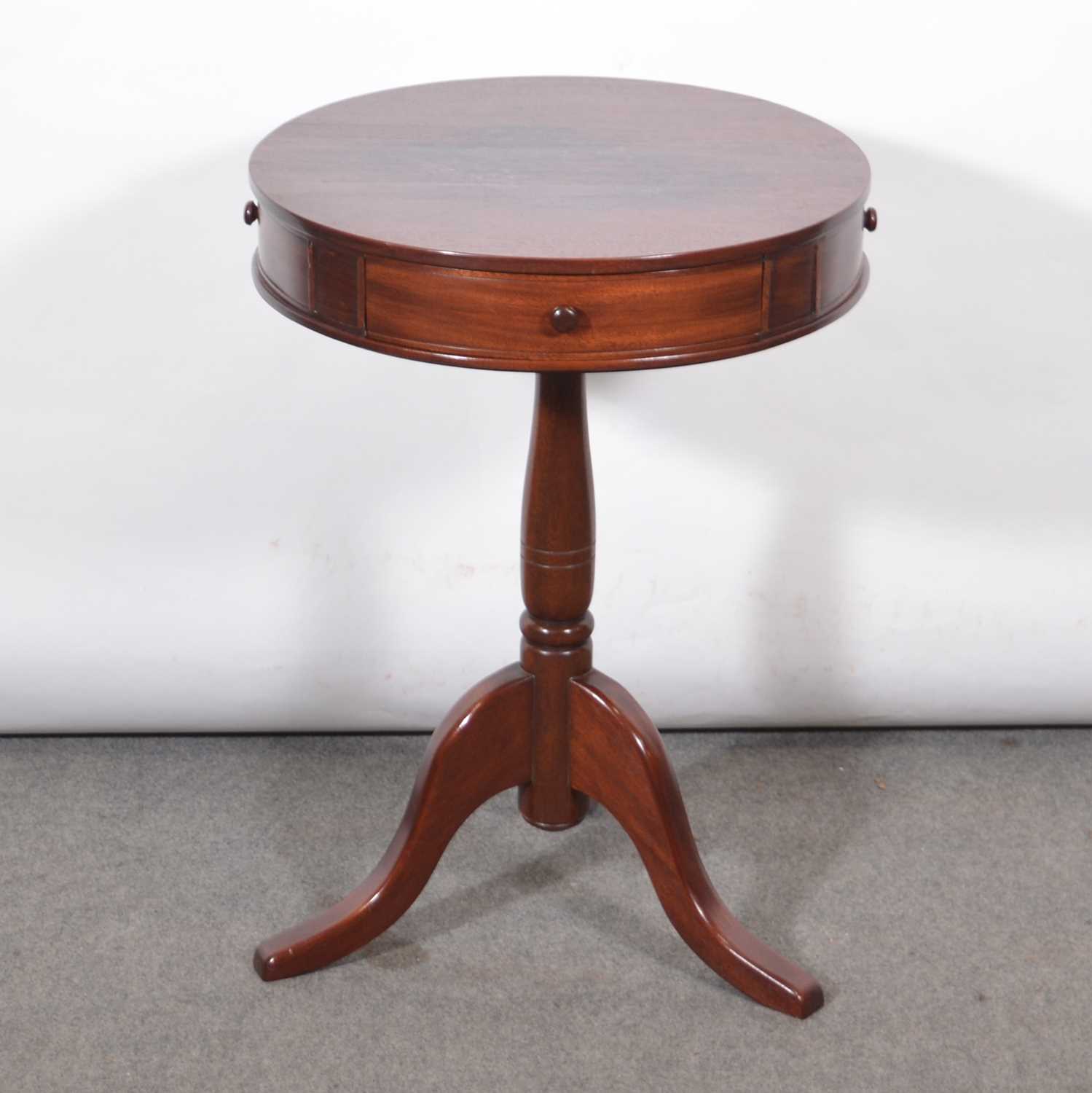 Lot 515 Reproduction mahogany drumtop table,
