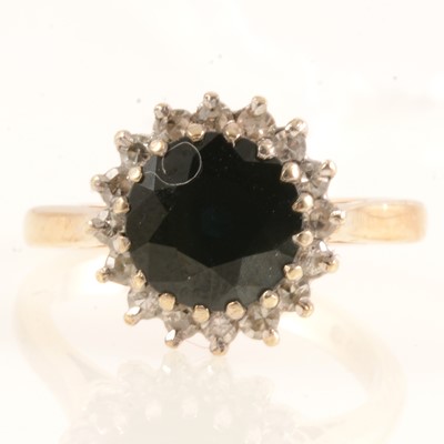 Lot 161 - Sapphire and diamond circular cluster ring.
