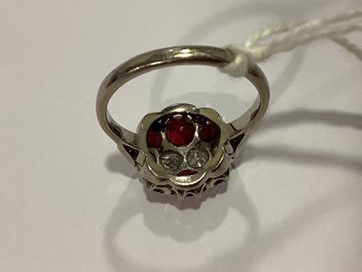Lot 167 - Ruby and diamond cluster ring