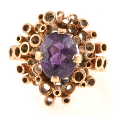 Lot 174 - Contemporary amethyst dress ring.