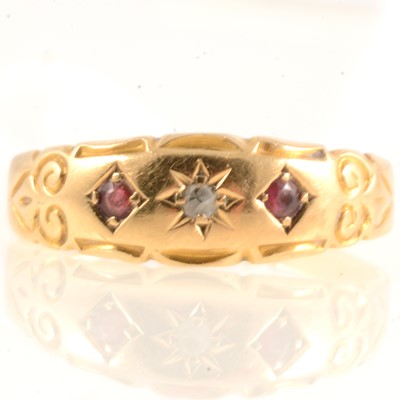 Lot 171 - Edwardian 18 carat yellow gold ring inset with two small rubies and a rose cut diamond