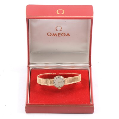 Lot 313 - Omega - a lady's 9 carat yellow gold bracelet watch, damaged.