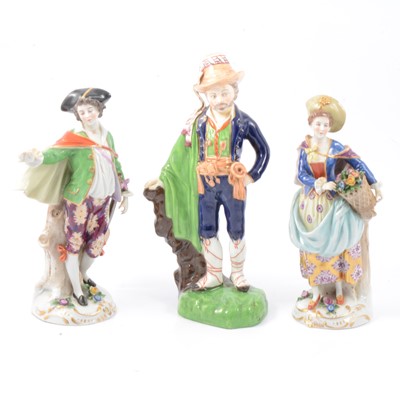 Lot 10 - Pair of Capodimonte figures and another figure.