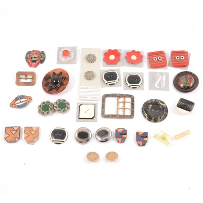 Lot 260 - Vintage buckles and buttons, in gilt metal and enamel, bakelite, plastic.