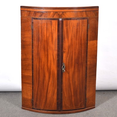 Lot 413 - George III inlaid mahogany cylinder front hanging corner cupboard