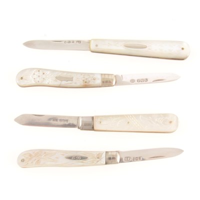 Lot 152 - Four mother-of-pearl and silver folding fruit knives.