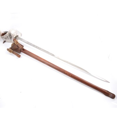 Lot 137 - A George VI, 1897 pattern British officers sword in leather scabbard.