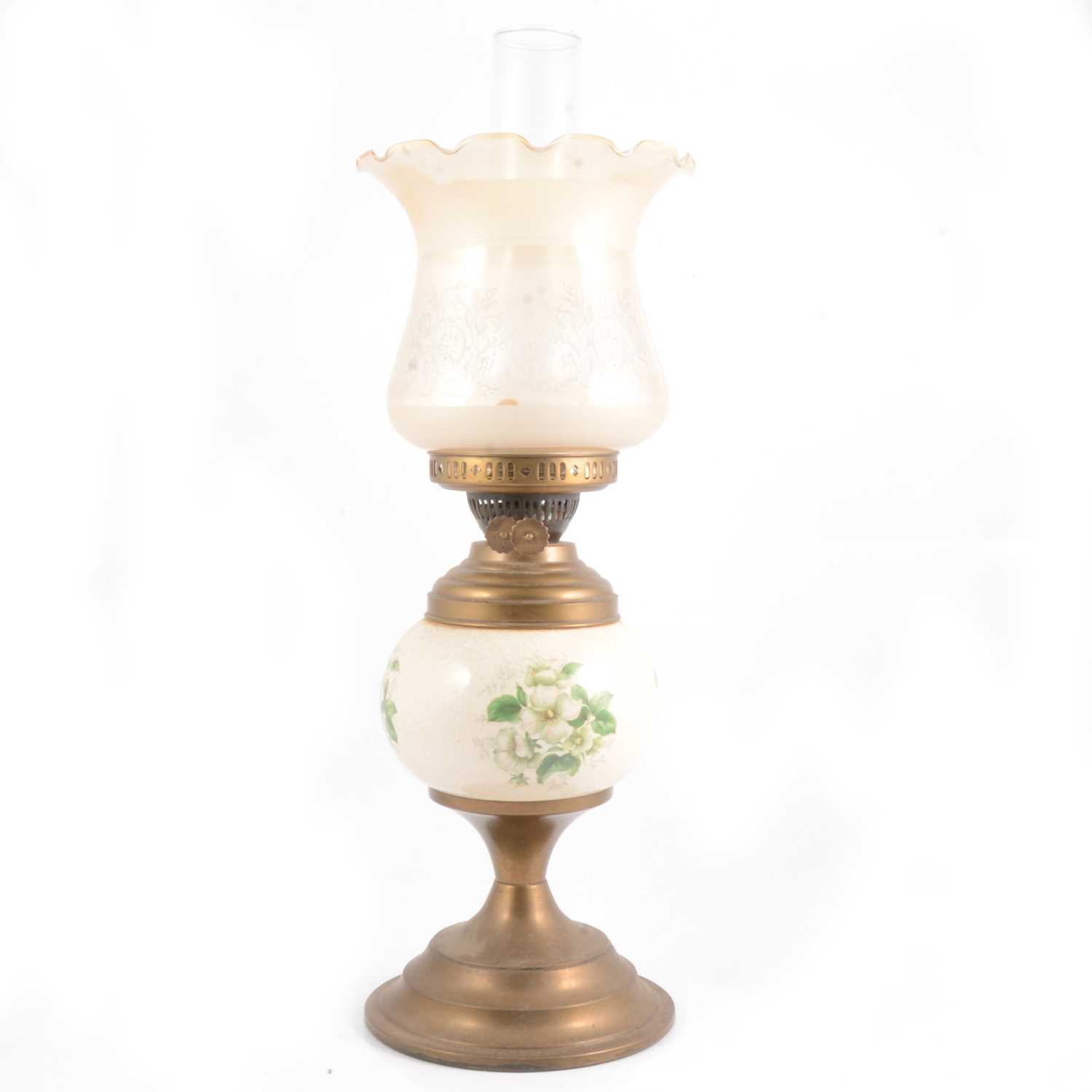 Lot 490 Brass and pottery based oil lamp.