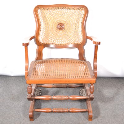 Lot 387 - American type walnut rocking chair