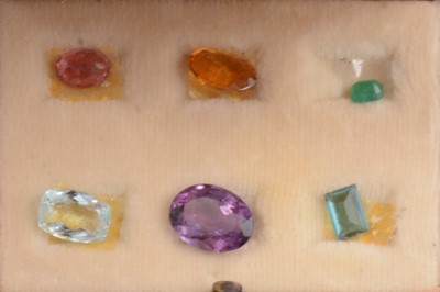 Lot 309 - Six gemstones in presentation box, emerald, aquamarine, tourmaline, topaz, amethyst.