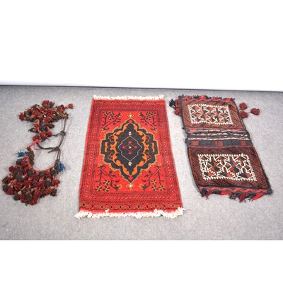 Lot 526 - Persian camel bag, 92x42cm, and a Bokhara mat, red ground, 106x51cm.