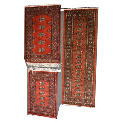 Lot 582 - Three similar rugs/ runners.