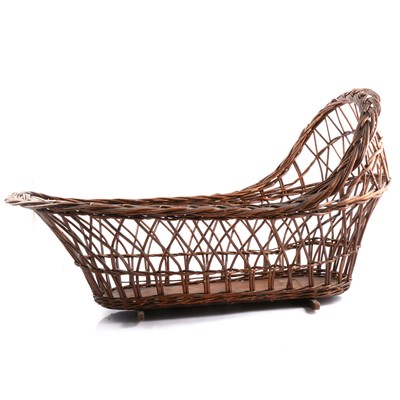 Lot 144 - Child's dark wicker crib.