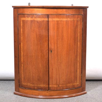 Lot 422 - Reproduction mahogany bowfront hanging corner cupboard