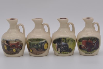 Lot 104 - Twenty four assorted Rutherford's ceramic decanters