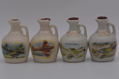 Lot 130 - Twenty one assorted Rutherford's white ceramic decanters, aircraft and aircraft history