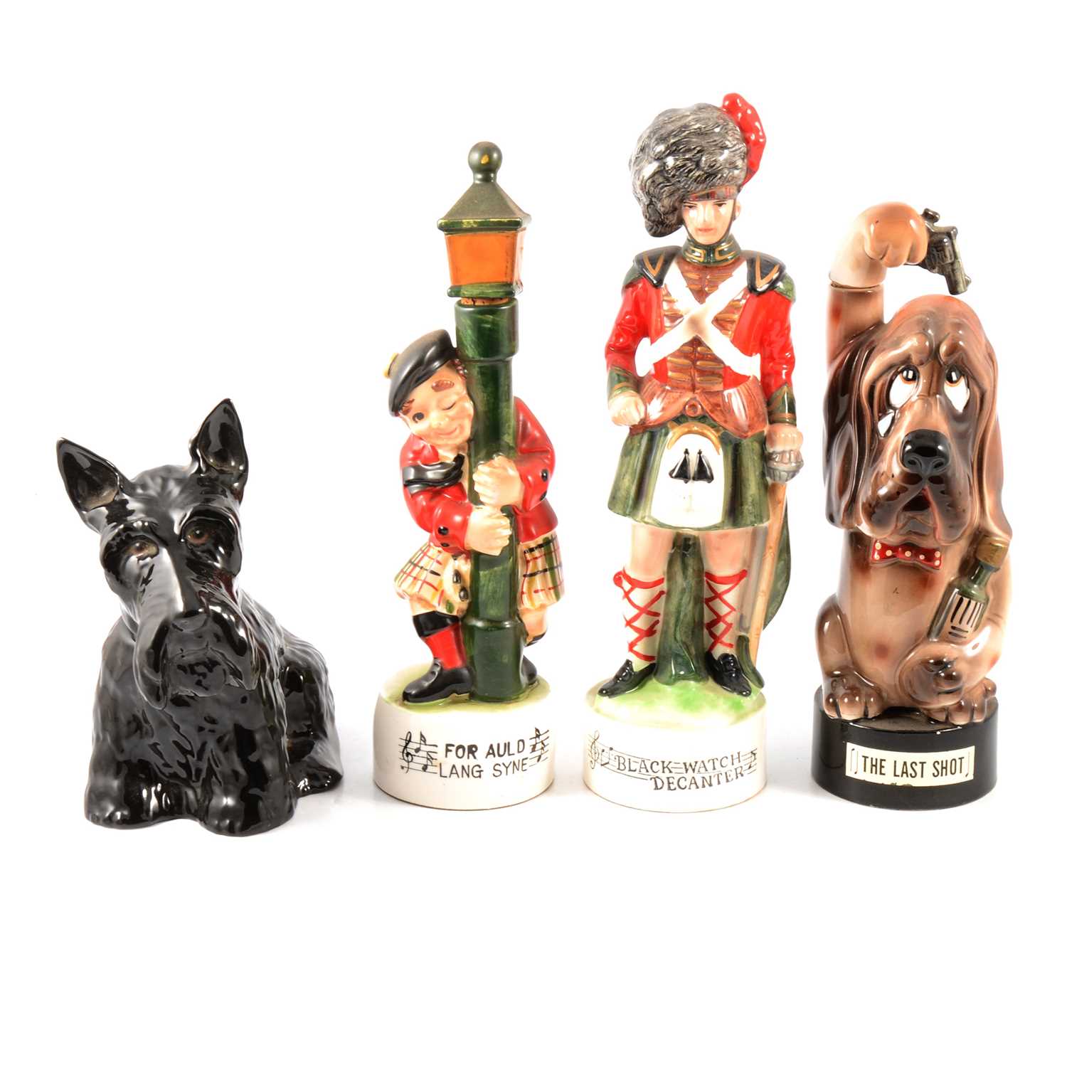 Collection of whisky ceramic flagons, decanters, and other branded items