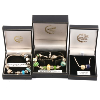 Lot 253 - Amore & Baci - two silver bracelets and a necklace all with beads - new and boxed.