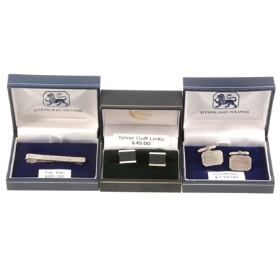 Lot 306 - Two pairs of silver cufflinks and a tie bar - new and boxed.