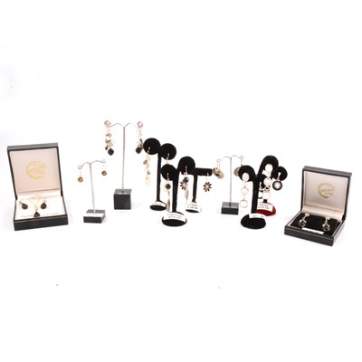 Lot 247 - Ten pairs of new silver earrings for pierced ears and pendant, stands included.