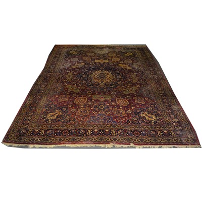 Lot 527 - Large Persian carpet.