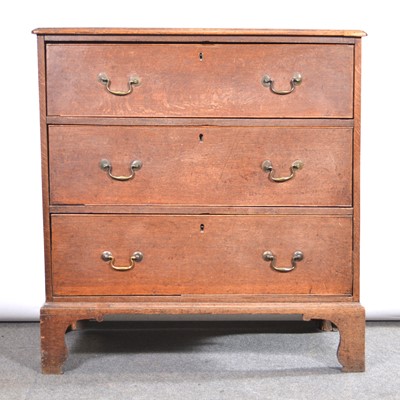 Lot 460 - George III oak chest of drawers