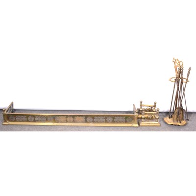 Lot 401 - Brass fender and fire irons