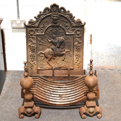 Lot 395 - Cast iron fire back, basket and fire irons.