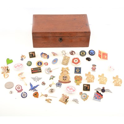 Lot 223 - Mahogany box containing badges and pins, NSPCC, Commemorative, RAF, Rowell Fair 2007 badges