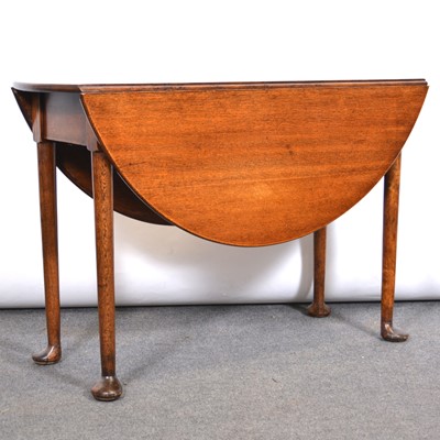 Lot 444 - George III oak dropleaf table