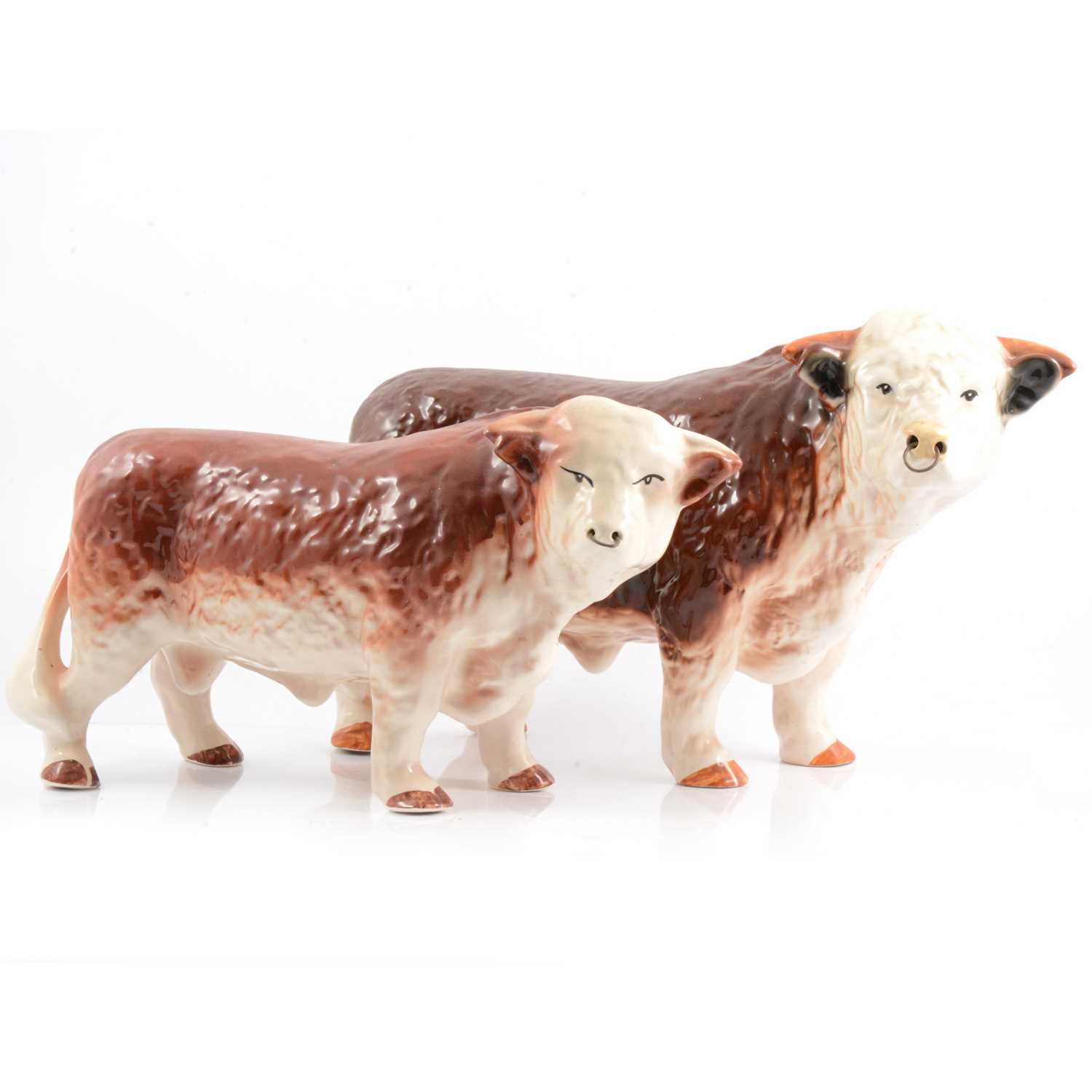 Lot 14 - Two Hereford china bulls.