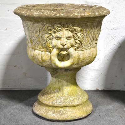 Lot 534 - Pair of modern stone pedestal planters