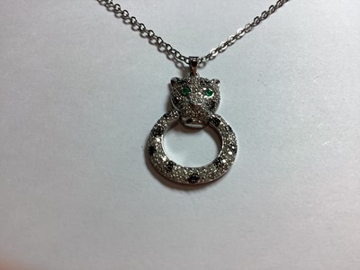 Lot 201 - Effy - Panther design pendant et with diamonds and emerald.