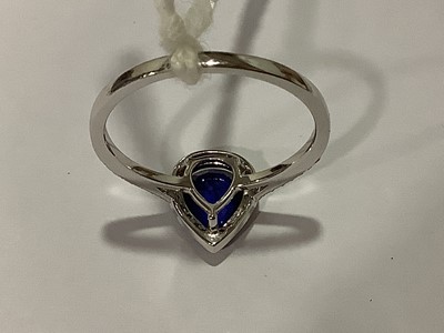 Lot 160 - Effy - A pear shaped sapphire and diamond cluster ring.