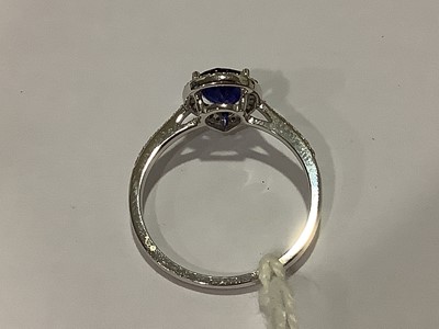 Lot 160 - Effy - A pear shaped sapphire and diamond cluster ring.