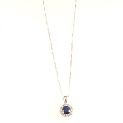 Lot 205 - Sapphire and diamond pendant.