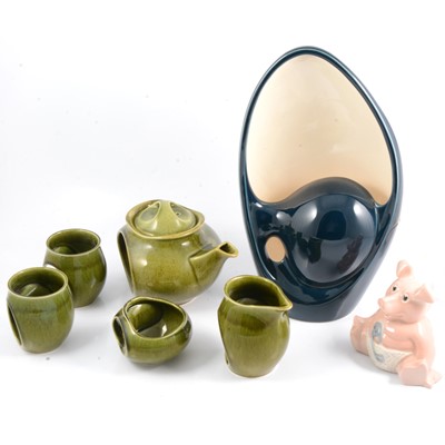 Lot 58 - Holkham Pottery blue and cream lamp base, green glazed two person tea set, Wade pig.