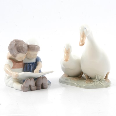 Lot 14 - Bing & Grondahl Copenhagen porcelain group of two children reading and another model of two geese