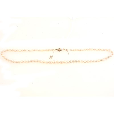 Lot 212 - Cultured pearl necklace with diamond clasp.