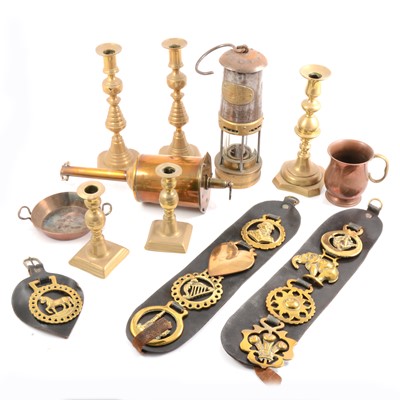 Lot 93 - Brass and metalware including a miners lamp, horse brasses, etc.