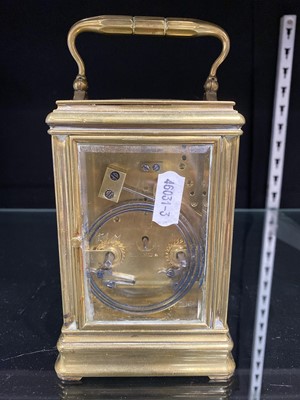 Lot 119 - Brass carriage clock by Drocourt, gorge case