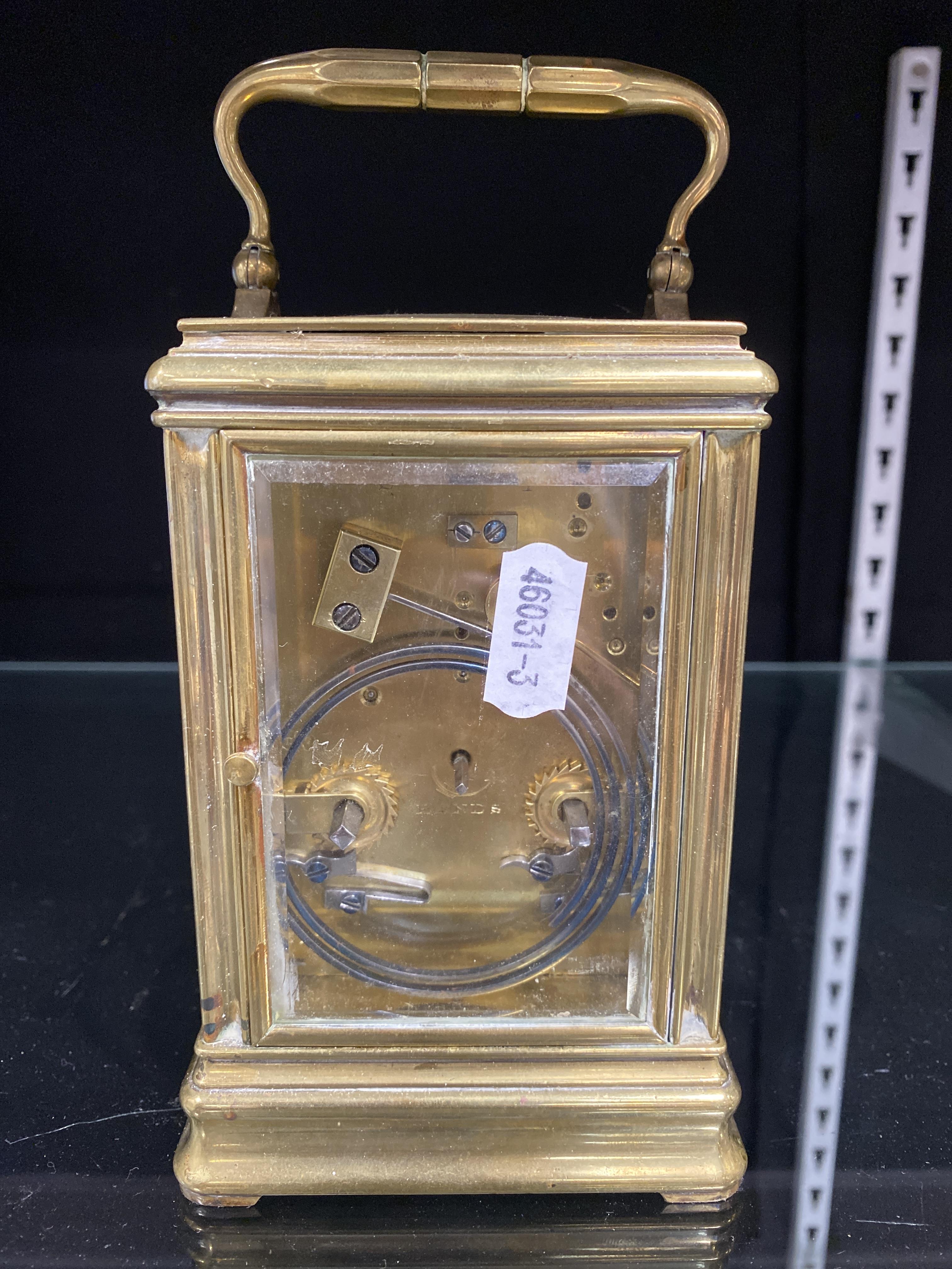Lot 119 Brass carriage clock by Drocourt, case