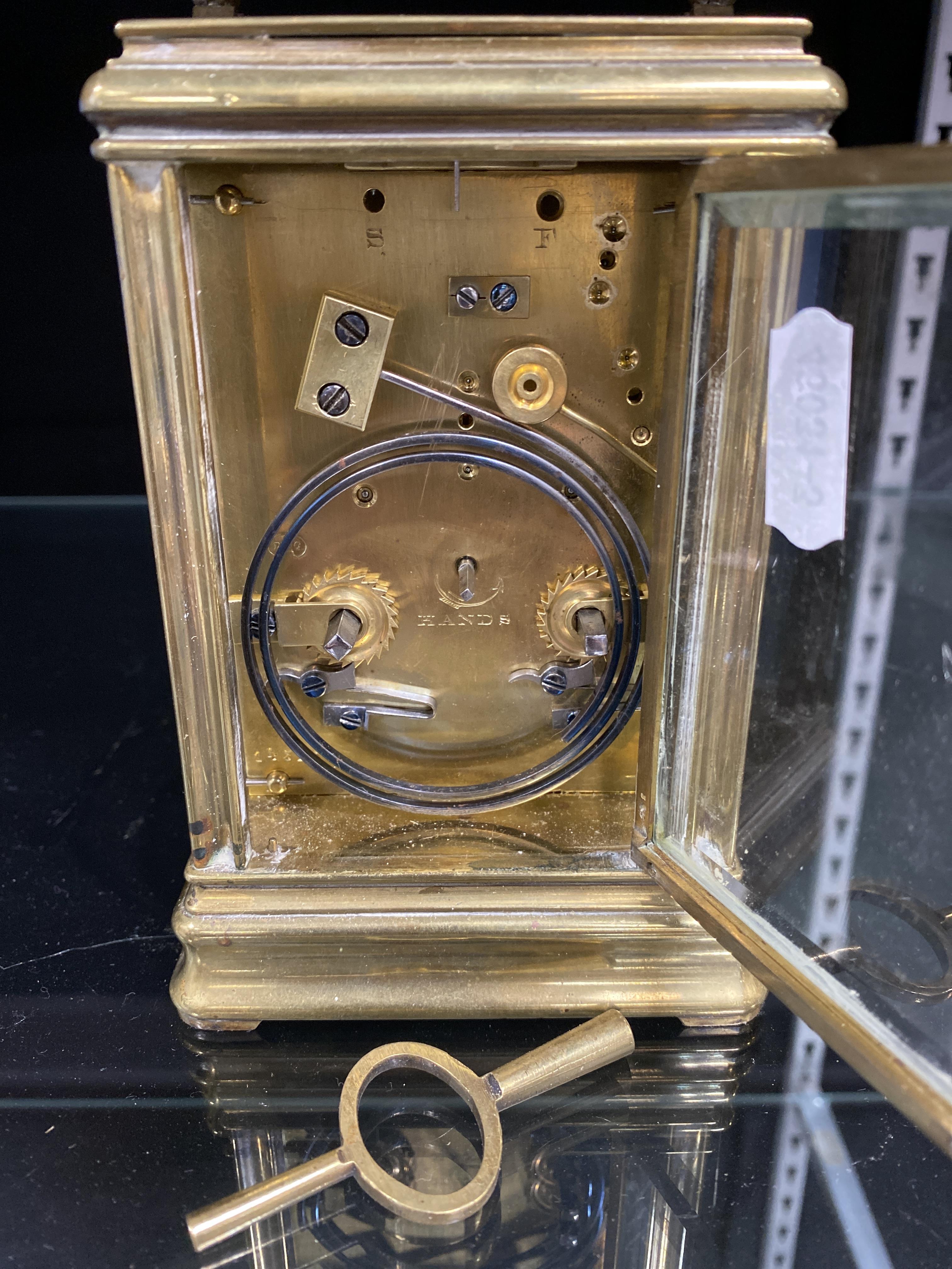 Lot 119 Brass carriage clock by Drocourt, case