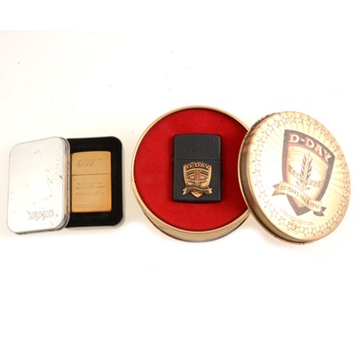 Lot 308 - Two Zippo cigarette lighters, 007 and D Day