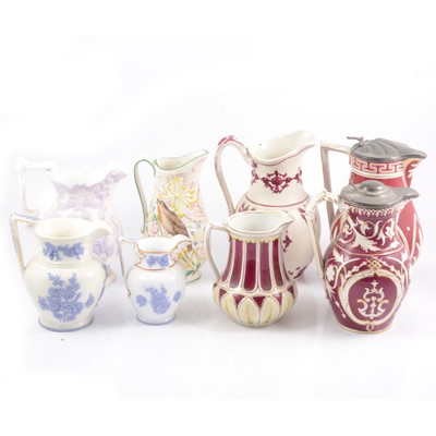 Lot 51 - Eight Victorian relief-moulded jugs.