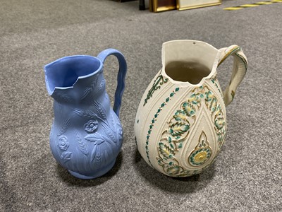 Lot 65 - Eleven assorted Victorian relief-moulded jugs.