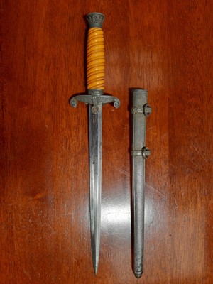 Lot 135 - Three replica German dress daggers and a replica socket bayonet