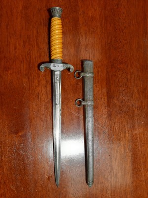 Lot 135 - Three replica German dress daggers and a replica socket bayonet
