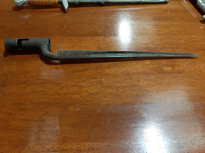 Lot 135 - Three replica German dress daggers and a replica socket bayonet